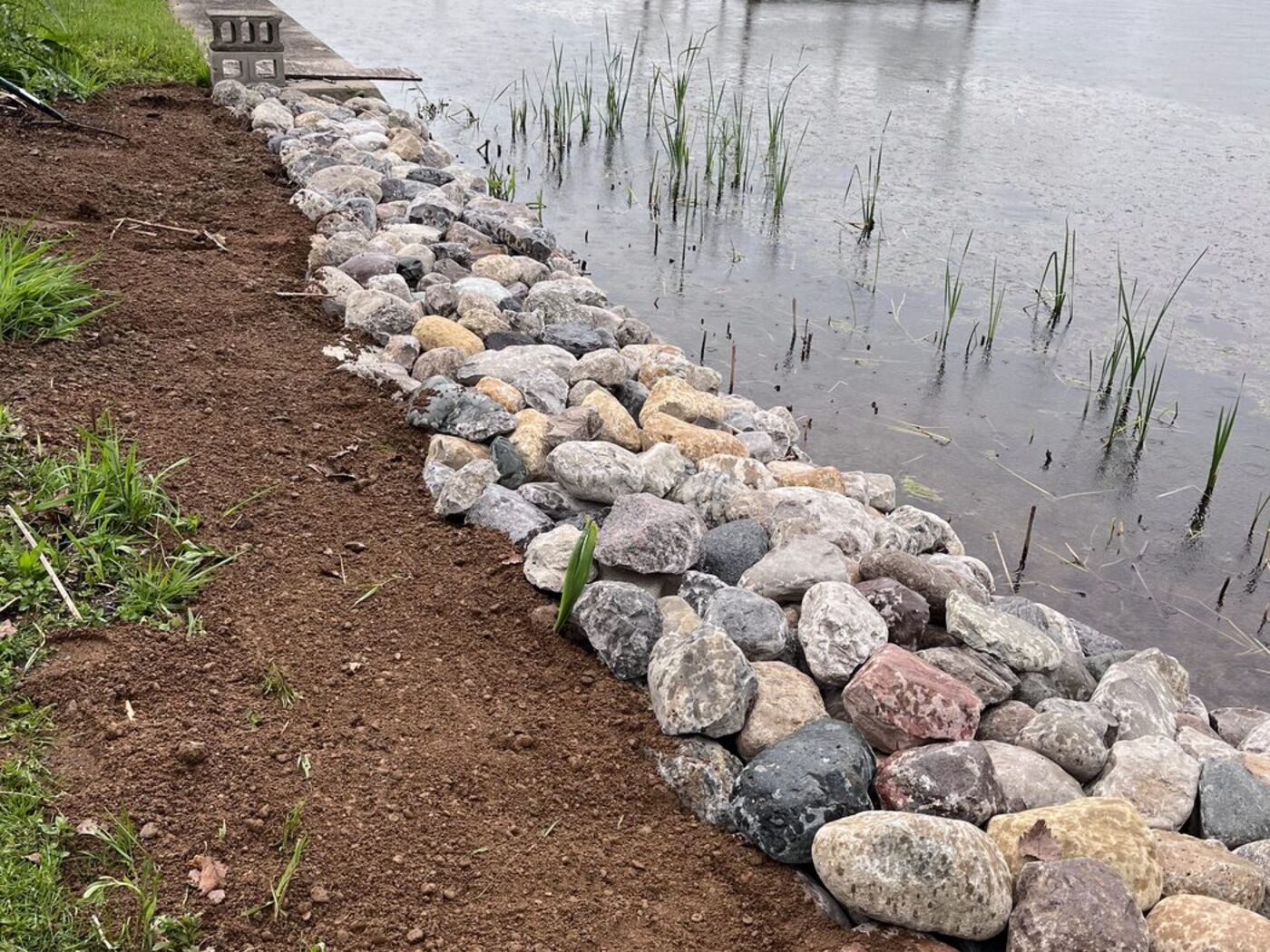 After: rebuilt stone shoreline