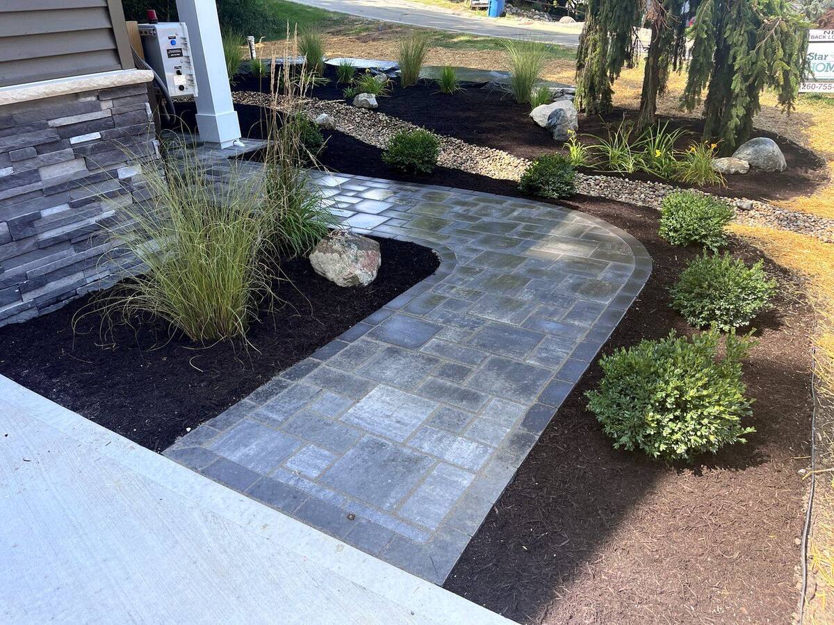 Paver sidewalk and landscape