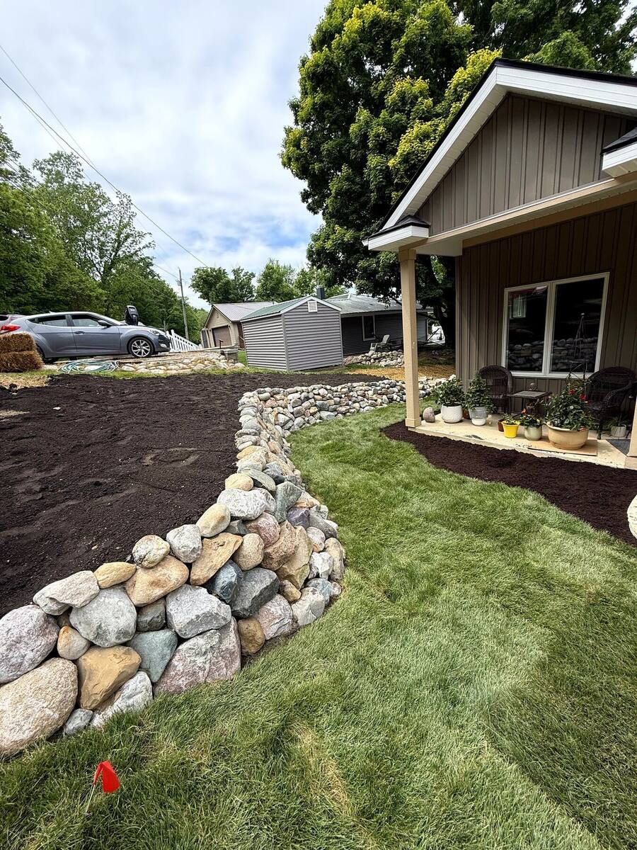 Retaining wall with sod